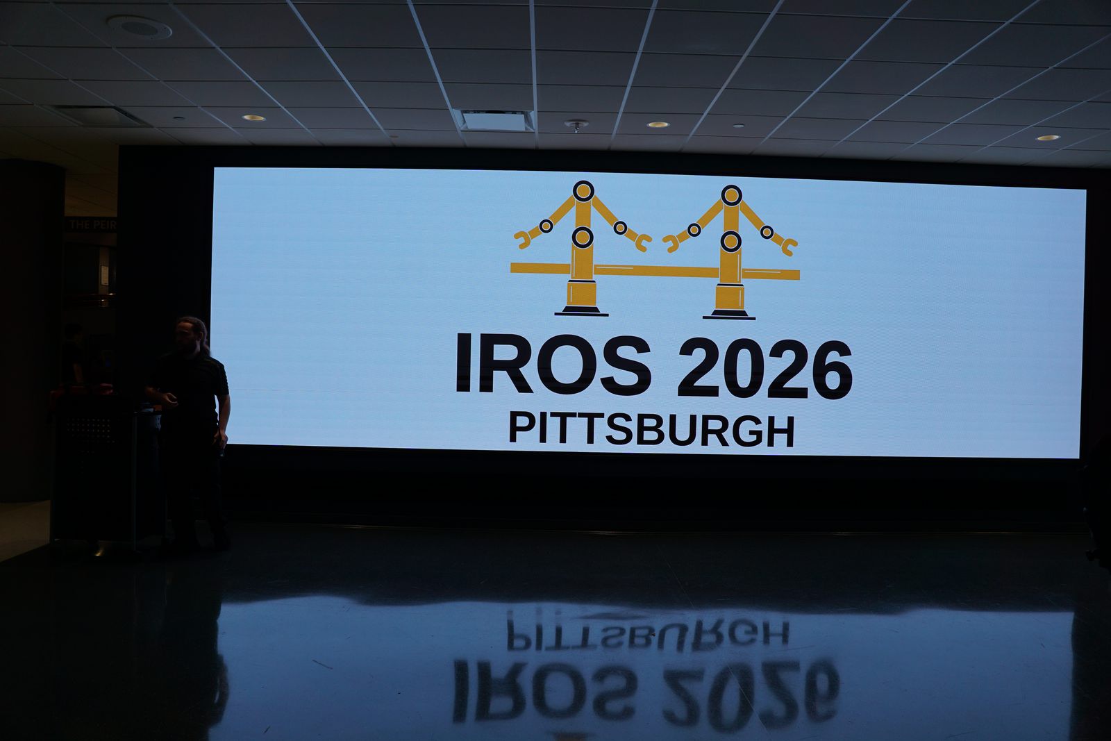 IROS 2026 Pittsburgh logo at the Carnegie Science Center.